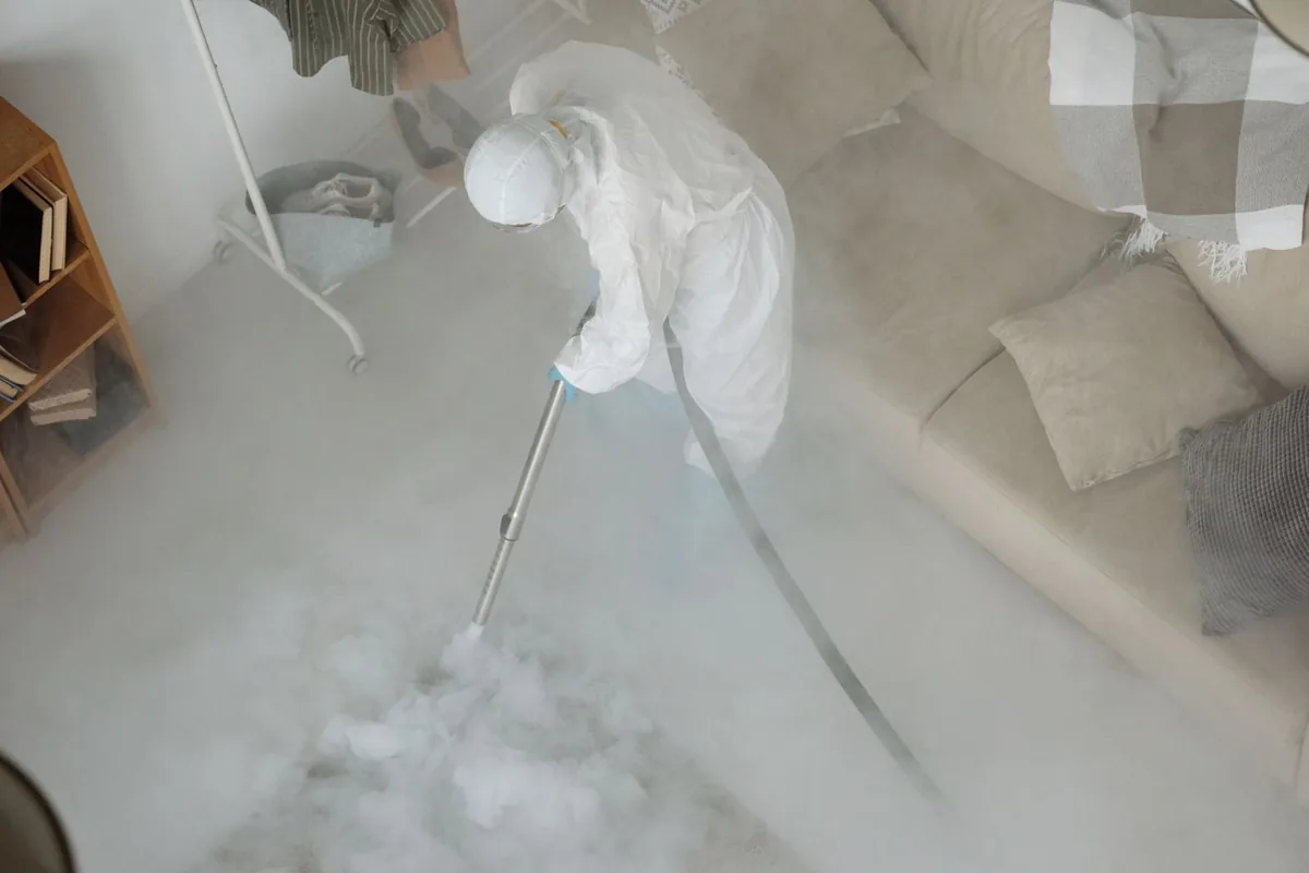 Biohazard cleanup technician in protective equipment, Wheatley Heights, NY